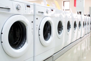 Maxi Mart Laundry & Dry Cleaners - Laundries